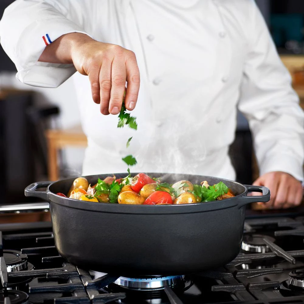 French Enameled 6 qt. Oval Cast Iron Dutch Oven in Caviar Grey with Lid by Chasseur - Image 3
